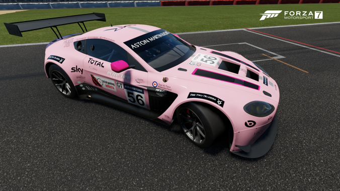 Elite Tier Racing livery on an Aston Martin GT car, including The Two Traders decals.